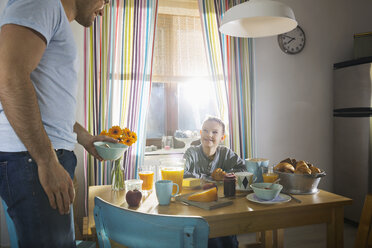 Father and son having breakfast together - PDF000727