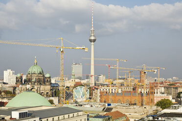 Germany, Berlin, view to Berliner Dom, television tower and construction cranes - MEM000706
