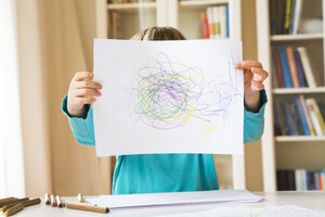 Little girl showing drawing - LVF002772