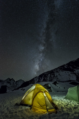 Nepal, Khumbu, Everest region, the milky way and tent from high camp on Pokalde peak at night stock photo