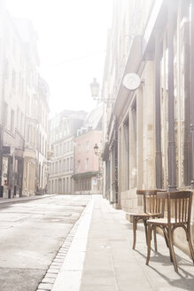 Luxembourg, Luxembourg City, empty street with two chairs on the pavement - CHPF000038