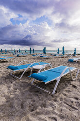 USA, Florida, Miami, lonesome beach with beach loungers - THAF001230