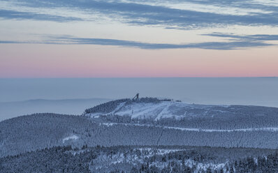 Germany, Saxony-Anhalt, Harz National Park, Mountain Wurmberg with ski jump at sunset - PVCF000263