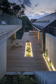 One family house, wooden terrace in the evening - DISF001161