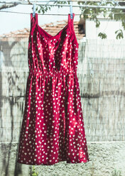 Bulgaria, red dress with heart shapes on laundry - DEGF000122