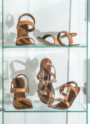 Leather sandals in a showcase of a shop - DEGF000257