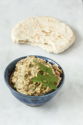 Bowl of Baba Ghanoush with flat bread - EVGF001104