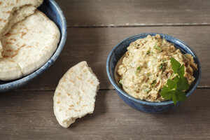 Bowl of Baba Ghanoush with flat bread - EVGF001105