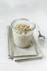 Glass of vegan cocos pudding with banana and tapioca granules - EVGF001112