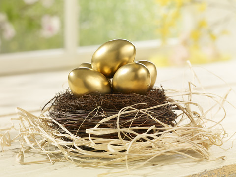 Eastern, Easter nest with golden eggs stock photo