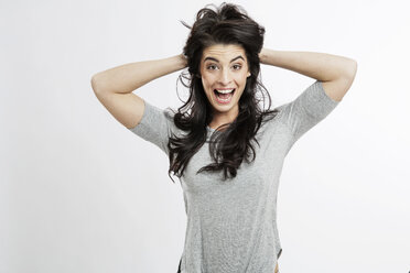 Portrait of excited young woman - GDF000673