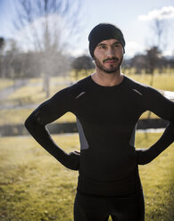 Spain, Gijon, confident athlete in park - MGOF000113