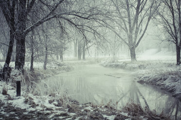 Germany, Bavaria, Landshut, flood channel in winter - SARF001344