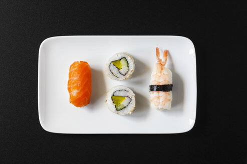 Variety of Nigiri Sushi and Inside-Out on plate - JTF000642