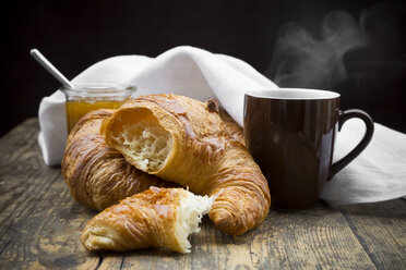 Croissants, fig jam and cup of hot coffee - LVF002898