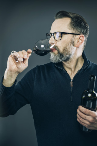 Man tasting red wine stock photo