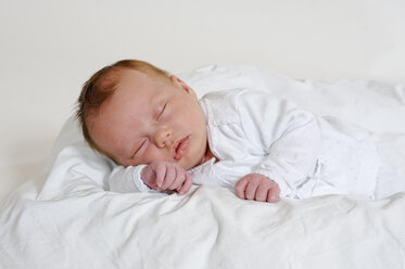 Baby, 4 weeks old, girl sleeps relaxed - LBF001068