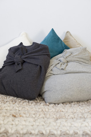 Pillowcases made of old pullovers stock photo