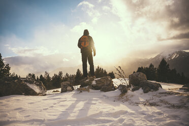 Spain, Catalonia, Cadi-Moixero Natural Park, man looking at view at sunset - GEMF000063