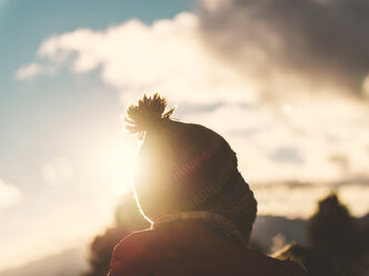 Spain, Catalonia, Cadi-Moixero Natural Park, man with woolly hat at sunset - GEMF000061