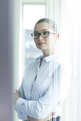 Young businesswoman with glasses, thinking - WESTF020980