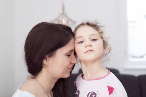 Portrait of mother and her little daughter stock photo