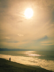 Silhouette of a woman on a beach, Pacific coast, Mexico - ABAF001637