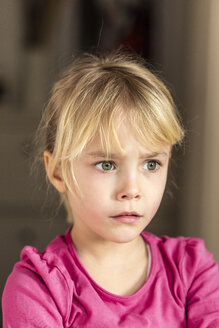 Portrait of a blond girl looking anxious - JFEF000576