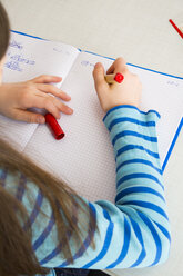 Girl doing mathematics homework - LVF002961