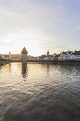 Switzerland, Canton of Lucerne, Lucerne, Old town, Reuss river, Chapel bridge and water tower at sunset - WDF002969