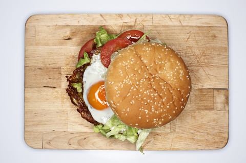 Hamburger with fried eggs, elevated view stock photo