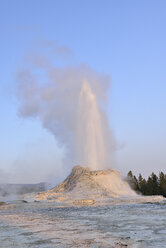 USA, Wyoming, Yellowstone National Park, Castle Geyser erupting - RUEF001568