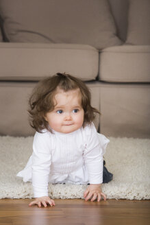 Little girl crawling on carpet - JTLF000059