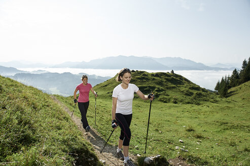 Austria, Two women Nordic walking at Kranzhorn - MAOF000064