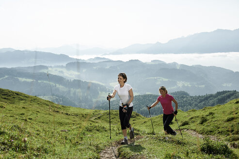 Austria, Two women Nordic walking at Kranzhorn - MAOF000066