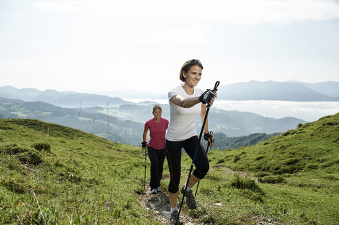 Austria, Two women Nordic walking at Kranzhorn - MAOF000067