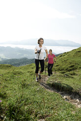 Austria, Two women Nordic walking at Kranzhorn - MAOF000069