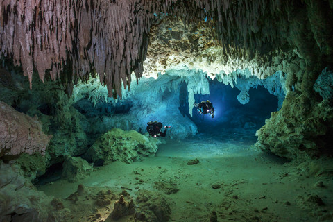 Mexico, Yucatan, Tulum, two cave divers exploring the cave system of Cenote Chan Hol stock photo