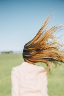 Wind moving long hair of a woman - JPF000031