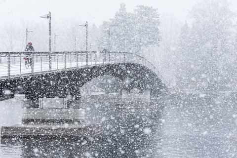 Germany, Baden-Wuerttemberg, Constance, Snowfall, Cycle bridge over Lake Rhine stock photo