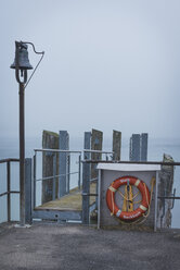 Germany, Thurgau, Steckborn, bell and lifesaver at harbour - KEBF000066