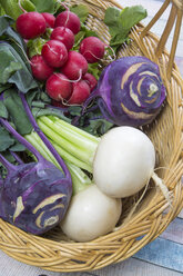 Wickerbasket of kohlrabi, red radishs and turnips - SARF001505