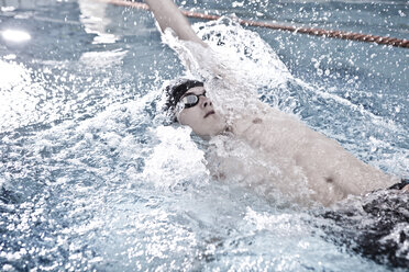 Swimmer training in indoor pool - ZEF004712