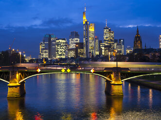 Germany, Frankfurt, River Main with Ignatz Bubis Bridge, skyline of finanial district in background - AMF003921