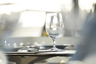 Wine glass on table in restaurant - MRF001540