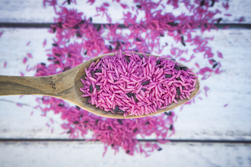 Pink organic basmati rice on spoon - LVF003087