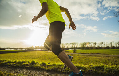 Germany, Mannheim, young man jogging - UUF003655