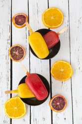 Ice lollies with blood orange and orange ice cream - SARF001534