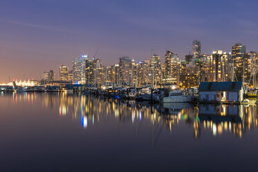 Canada, British Columbia, Vancouver, skyline at dusk as seen from Stanley Park - KEBF000019