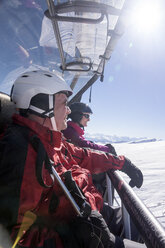 Austria, Vorarlberg, Damuels, man and woman in ski lift - CHPF000117